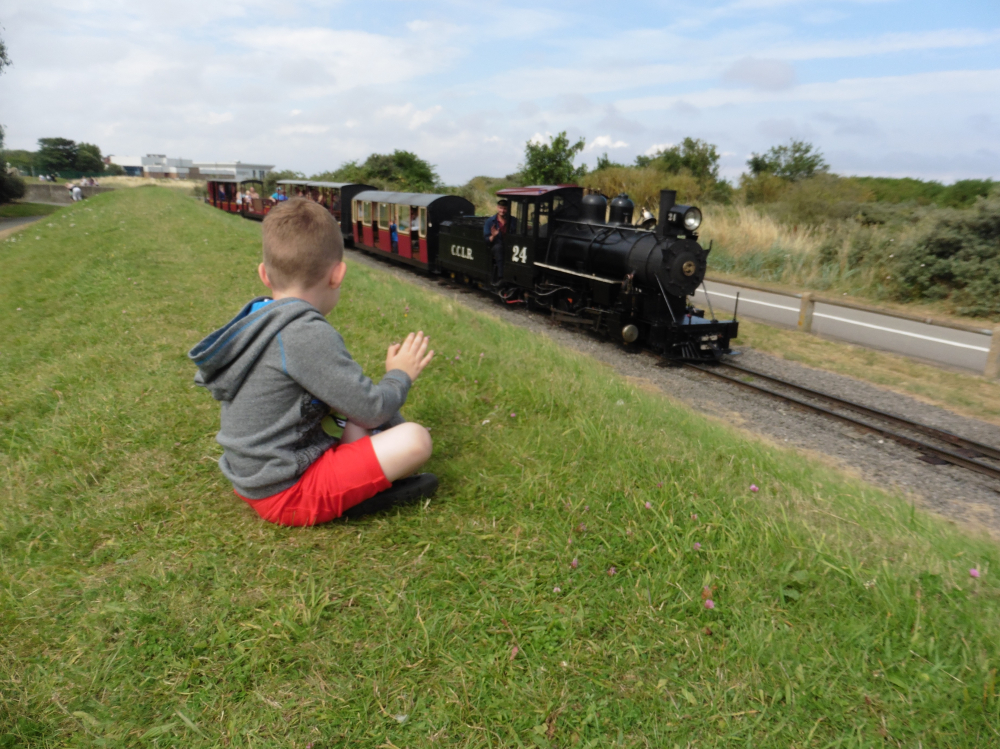 Child watching the train at Cleethorpes Coast Light Railway